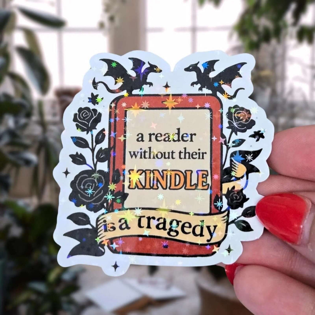 A Reader Without Their Kindle Is A Tragedy - Sticker - Holographic Sticker | The TabbyLoaf
