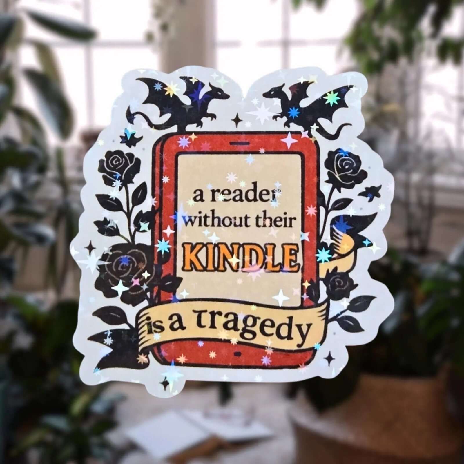 A Reader Without Their Kindle Is A Tragedy - Sticker - Holographic Sticker | The TabbyLoaf
