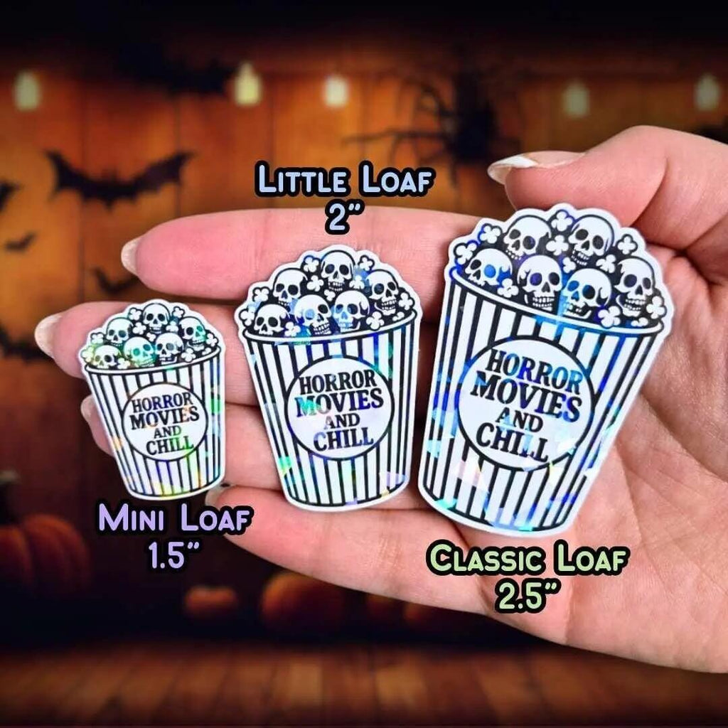Horror Movies and Chill - Sticker Holographic Popcorn Bucket with Skulls | Spooky Halloween Vinyl Sticker for Laptop, Water Bottle, Journal - Holographic Sticker | The TabbyLoaf
