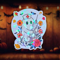 Gem holographic nurse ghost sticker with syringe and flowers, cute spooky medical theme, perfect for nurses and Halloween fans