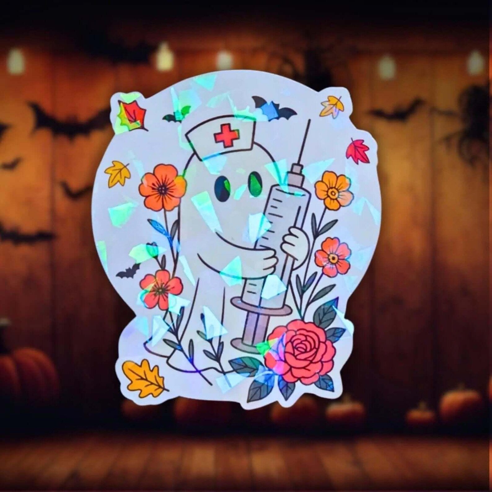 Gem holographic nurse ghost sticker with syringe and flowers, cute spooky medical theme, perfect for nurses and Halloween fans