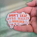 Don’t Trip Over What’s Behind You Sticker – Holographic Motivational Quote Vinyl Decal | Laptop, Journal, or Water Bottle Sticker