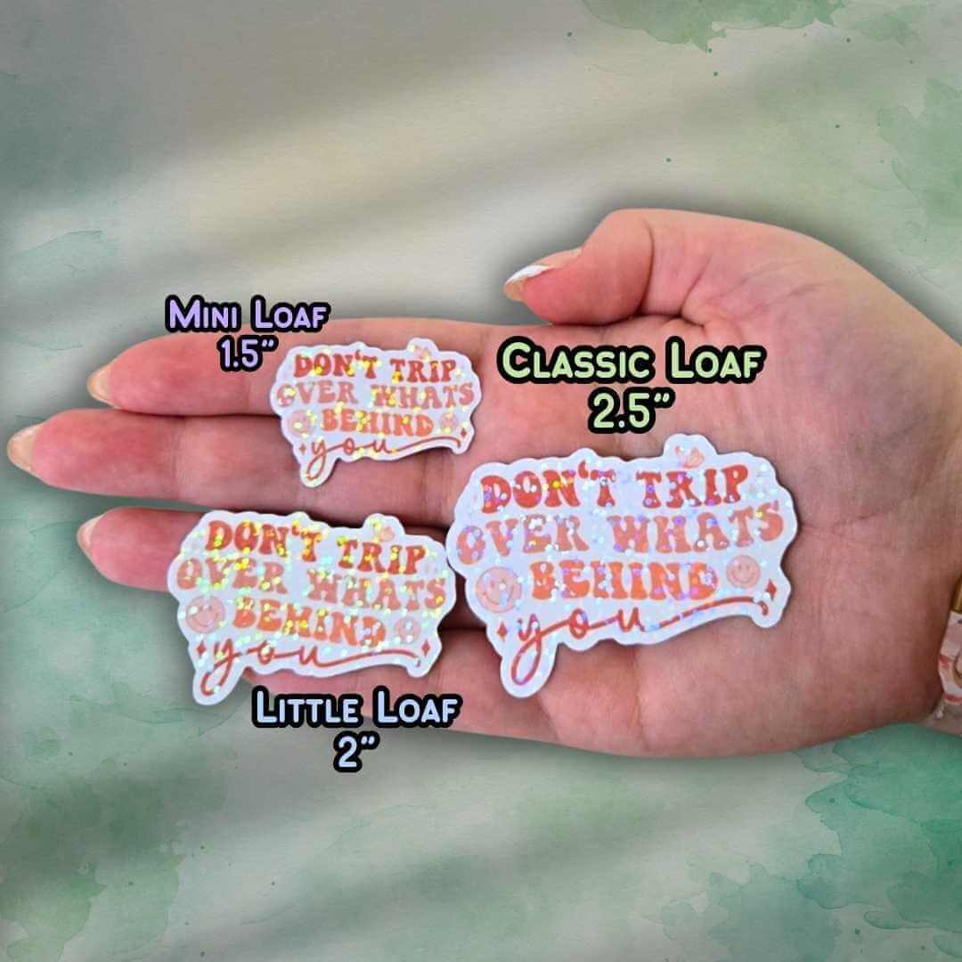 Don’t Trip Over What’s Behind You Sticker – Holographic Motivational Quote Vinyl Decal | Laptop, Journal, or Water Bottle Sticker
