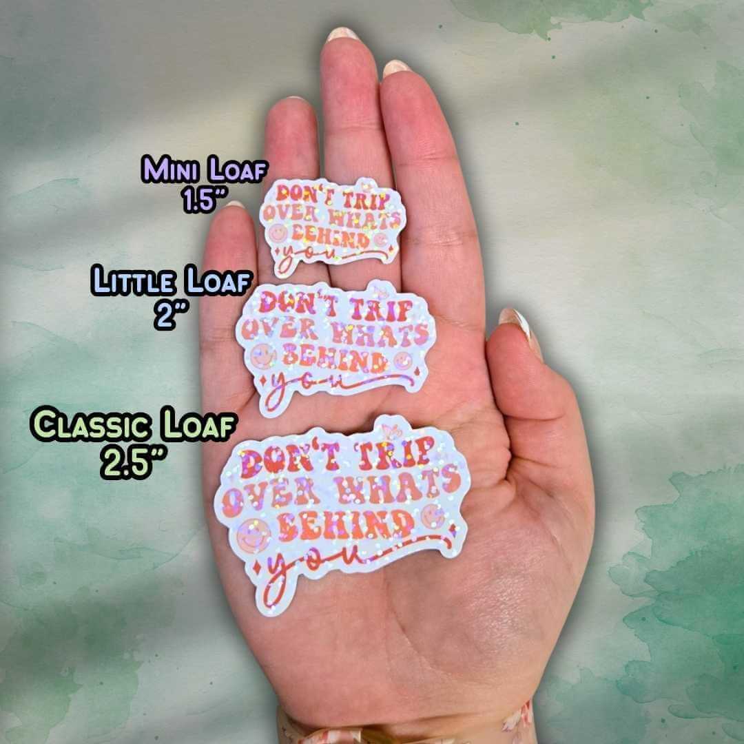 Don’t Trip Over What’s Behind You Sticker – Holographic Motivational Quote Vinyl Decal | Laptop, Journal, or Water Bottle Sticker