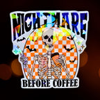 Gem holographic Nightmare Before Coffee sticker showing skeleton with coffee cup, orange checkered background, funny spooky caffeine design