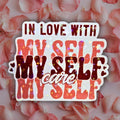 Star holographic In Love With My Self Care sticker with retro red lettering and hearts, empowering self-love design for mirrors, laptops, and journals