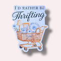 Star holographic I’d Rather Be Thrifting sticker with vintage shopping cart and blue china — cozy nostalgic design for eco and vintage style lovers.