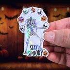 Stay Spooky - Sticker Holographic Skeleton Juggling Skulls & Pumpkins | Cute Gothic Halloween Vinyl Sticker for Laptop, Water Bottle - Holographic Sticker | The TabbyLoaf