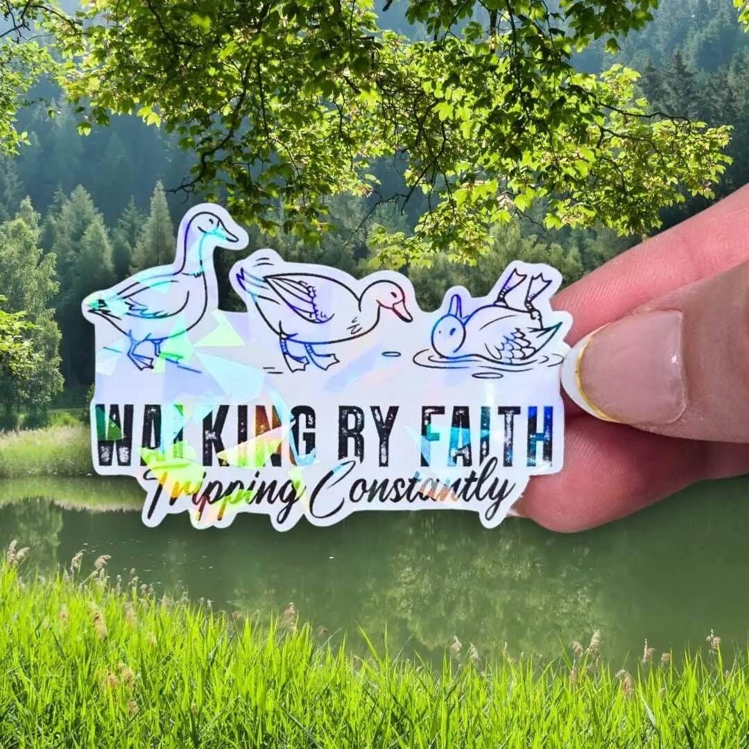 Walking by Faith Tripping Constantly Ducks - Sticker Holographic Funny Christian Duck Vinyl Sticker | Faith Humor Sticker, Religious Ducks - Holographic Sticker | The TabbyLoaf